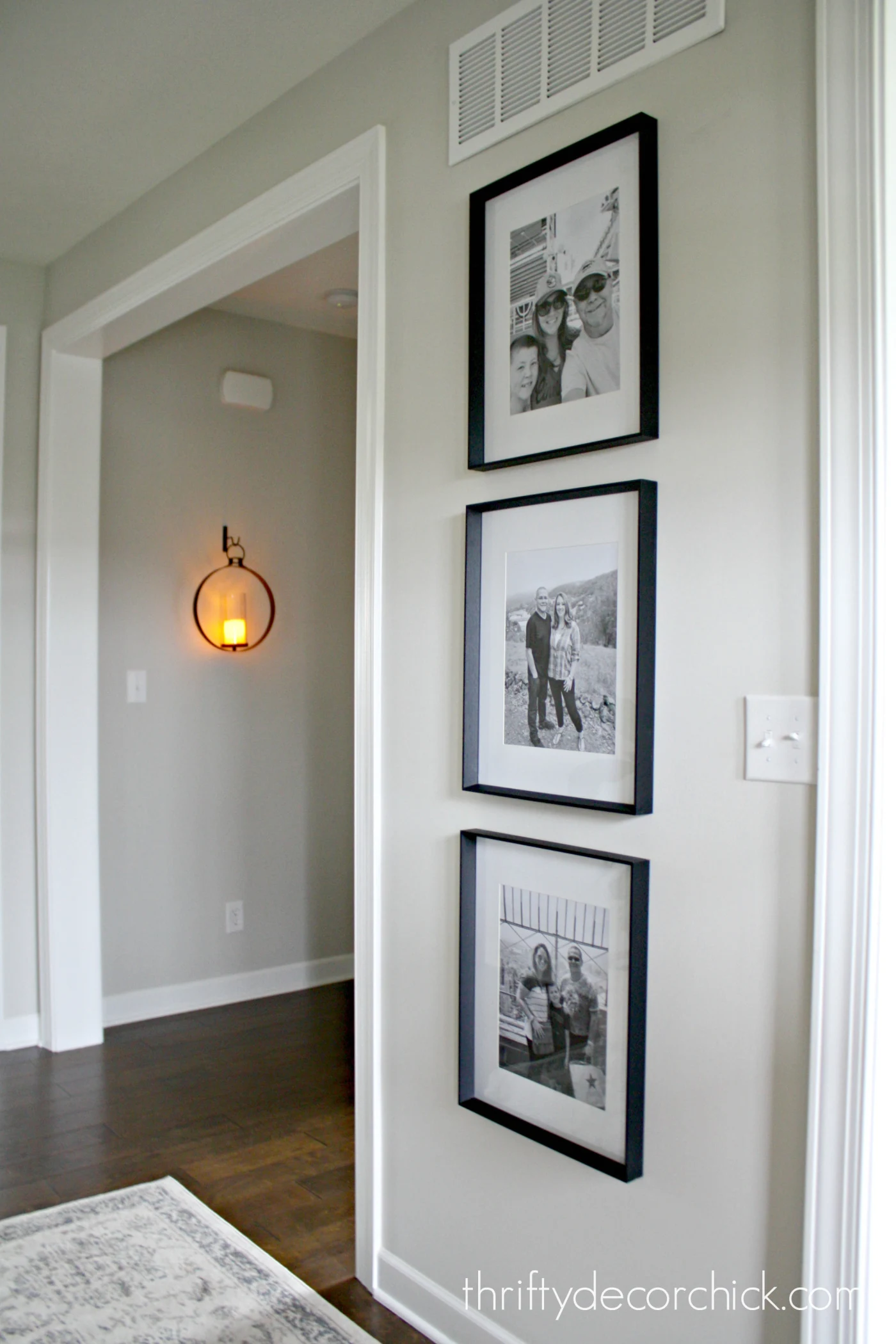 three vertical photo frames
